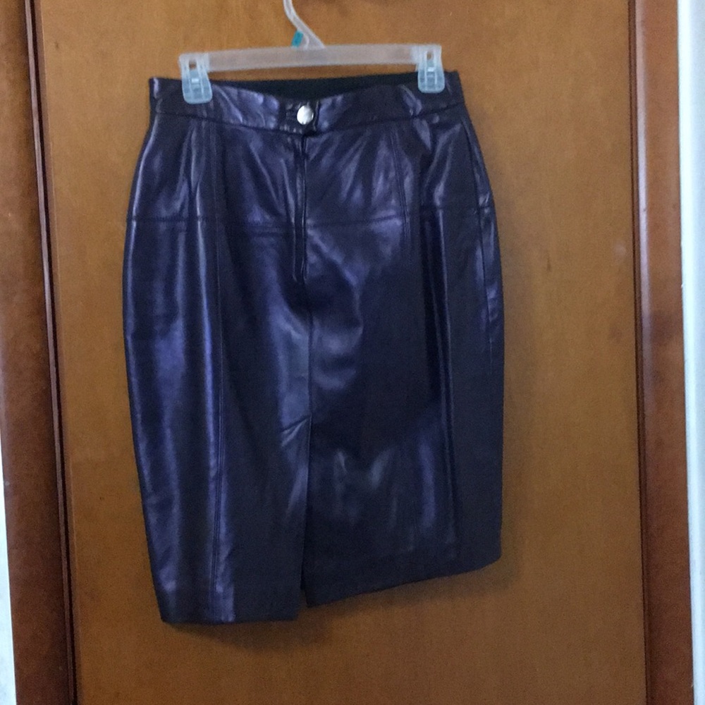 Very nice skirt In Eggplant color sz varies.